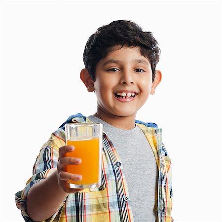 Indian kid drinking Stock Photos - Page 1 : Masterfile