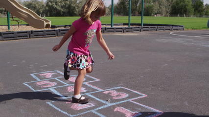 Little Girl Playing Hopscotch at : стоковые видео (без ...